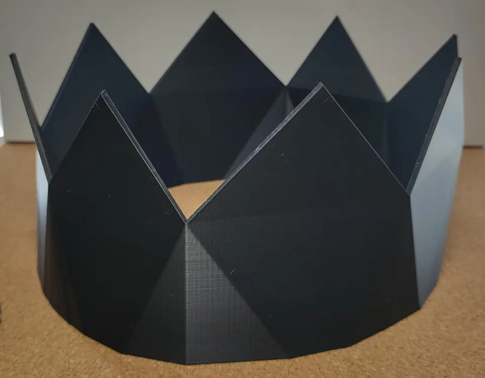 Black party hat — the keychain comes in the same matte black